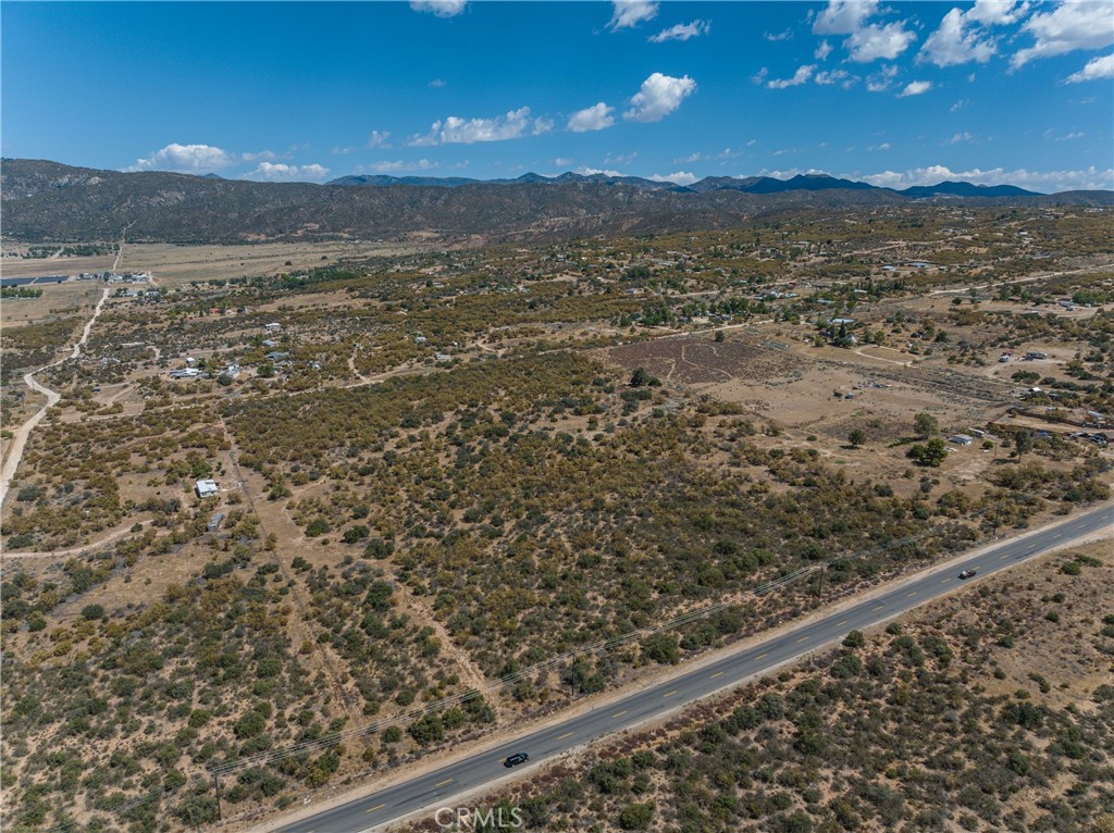 2- Separate Parcels being sold separately or together. Prices as follows
APN's 575-190-002 (4.78 acres 80K) , APN 579-190-003 (9.55 Acres 100K),
Property is fully fenced as one piece at this time. It is located on paved Wellman with access and we are attaching a map for you.
Share the dream with others and make it a party purchase. Builders site for sure. !!!!
You could sell them off separately once you own them. Put the homestead on one parcel and plants on another and your food supply on another. The possibilities are endless Zoning RR 2-1/2 Elevation 4074 4 Mild seasons Very Close to town. 40 to Temecula or Hemet or Palm Desert. Just think 2 hours to snow or the beach or amusement parks. Perfect location (ANZA) Make an offer on both for a better price
Surveys are now completed