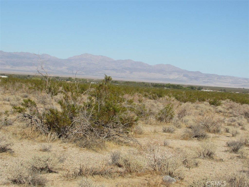 There is not an address associated with this parcel. What is reflected is the Parcel# of 469-211-13-00-3 which is +/- 2.51 AC. Zoning is PL RS MH. Located in the area of Cantil which is Unincorporated Kern County.