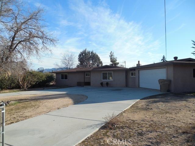 Nice property that has been nicely updated. 5 bedrooms and 2 full baths, open and spacious plan. Kitchen offers granite countertops with lots of workspace for the chef. Tiled and laminate flooring thru-out. Split bedroom plan offers 2 bedrooms in one wing and balance of bedrooms in 2nd wing. Baths are upgraded with granite and nicely appointed cabinetry and fixtures. Fireplace in great room along with large slider for rear yard access. Newer energy saving windows also installed. All the work is done, ready to call it home! Association Amenities: None # of RV Spaces: 0NONE Lot Location Type: Standard Location Special Features: None # of Attached Spaces: 2 # of Detached Spaces: 0