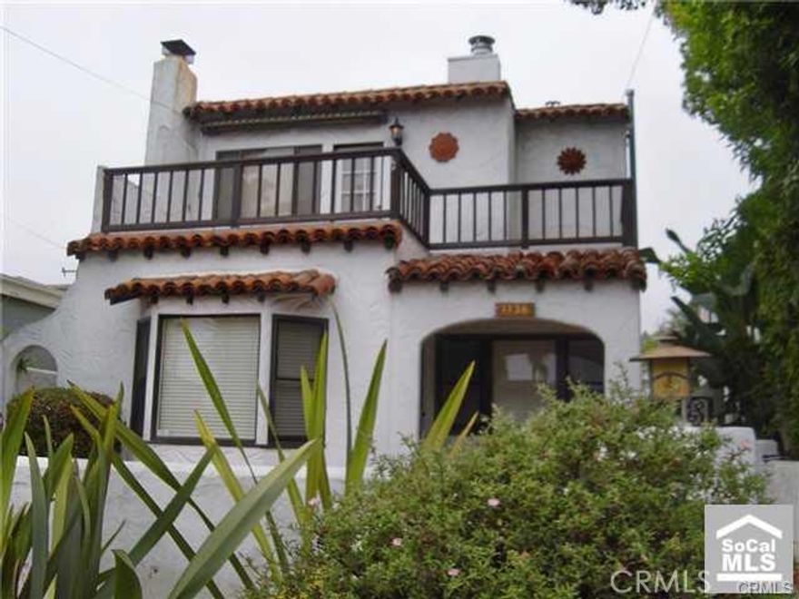 Classic Spanish style charm located in desirable Laguna Village.  Wood floors, classic fireplace in living room and master bedroom.  Two bedrooms and a new full bath down stairs.  Master bedroom upstairs is extremely private and the attached office could be used as an additional bedroom.  The deck

off of the master has a peek of an ocean view. There is a one car garage off of the alley and an additional parking space by the garage.  There is also

a storage room by the garage. Private patio areas and front yard.  Beach close.