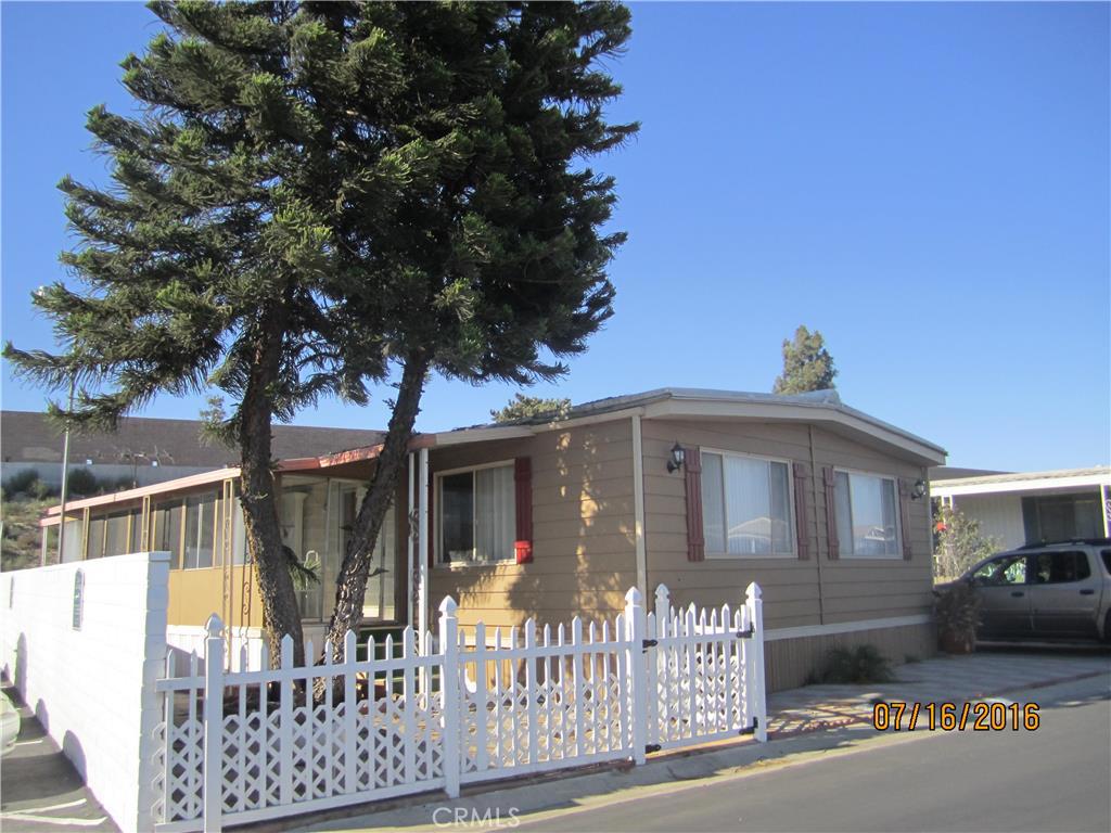 Great starter family mobile home. Corner lot with reasonably priced to sell. Spacious and affordable. Good size family room, formal dining room and master bedroom. Enclosed sunroom for retreat. Tile floor throughout bedrooms and bathrooms. Gated community with pool and park. Community hall for party and entertain your holidays and friends. Easy access to shopping centers and freeways. All information is deemed reliable, but not guaranteed. Buyer to do their own due diligence.