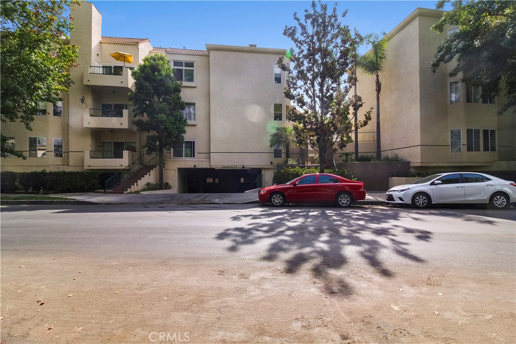 Welcome to this beautifully renovated bright top-floor penthouse. Highly desirable Chandler Park Village, Incredible Resort Style Complex in prime Sherman Oaks! This unit features 2 bedrooms and 2 bathrooms. Spacious loft could be used as a 3rd bedroom, den/office. Also features a private rooftop porch/patio. Vaulted ceiling living room with its own fireplace, dining room, balcony, storage, kitchen with white modern custom cabinets, stainless steel appliances, quartz countertops, glass tile back-splash, laminated wood, and tile flooring throughout. Marvelous master bedroom with 2 walk-in closets, upgraded bathroom with custom dual vanity, elegant tiled shower and bathtub, inside laundry room washer/dryer included. Assigned 2 car parking spaces in the gated garage. The complex is gated and boasts a sparkling pool, spa, fitness room, and BBQ area. Close to parks, restaurants, major shopping centers, and easy access to freeways.