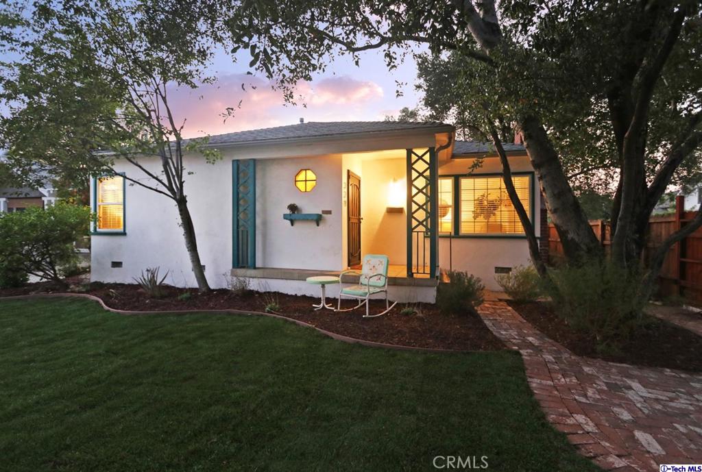 Mid Century character, incredible location and Highland Park charm collide to bring you this incredible gem! The main house features 2 bed / 1 bath plus an enclosed sun porch that could double as a home office or creative space. Upon entering past the lush privacy hedging, custom landscaping and a sweet little front porch you'll find a perfect layout that boasts large rooms and maximizes space with ease. Features include: beautiful original hardwood floors, unique architectural details, custom mid century lighting, a cozy fireplace, formal dining room and the list goes on! Venture out back to discover a totally fenced in courtyard with lots of space to grill veggies fresh from your nearby custom vegetable garden or dine al fresco under the magical string lights! Just beyond the fence awaits a large, beautiful and bright 1 bed 1 bath 2nd unit above the large 2 car garage (Both units delivered vacant BTW!).. The upstairs unit comes fully packed with its own privacy and charm. Hardwood floors, original details and lovely views overlooking mature green trees and the historic Garvanza neighborhood below. Both units come with their own laundry rooms as well! Trendy restaurants, art galleries and boutiques are all but a stone's throw away in one of the best little pockets of Highland Park. The Garvanza district has tremendous character and retains a total small town neighborhood feel while still being in the heart of everything! This one checks all the boxes! Copy & Paste this link for property video:https://player.vimeo.com/video/589957897 Copy & Paste this link for the virtual tour:https://my.matterport.com/show/?m=BF9He9gjAzx&mls=1