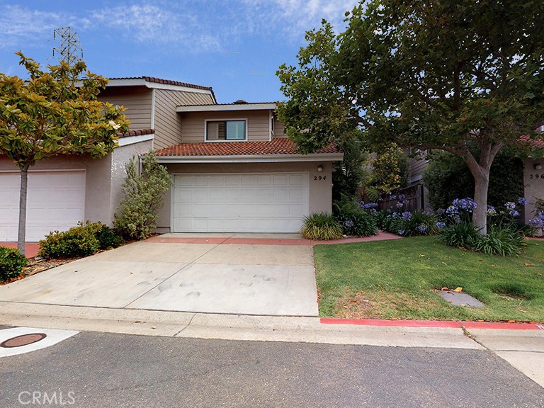 Pride of ownership has been put into this recently remodeled, elegantly appointed Margarita Villas home, one of the most serene Planned Unit Developments in San Luis Obispo. Cathedral ceilings provide an airy feeling in the living room that flows onto the fenced patio. Many delights await your discovery inside this pristine two master bedroom, 2 1/2 bath PUD with new interior paint, designer bathroom vanities and lighting, new glass shower doors in two of the bathrooms and a newly remodeled kitchen with stainless steel appliances and white shaker cabinets. The downstairs flooring is a durable luxury vinyl plank. In front of the two car garage is a full-sized driveway not found in many developments. Stroll the pathways with the sound of the trickling pond in the background. Enjoy the newly refurbished pool and spa and the lush greenbelt that surrounds this community. The HOA is replacing all the roofs in this community and this unit is scheduled for sometime in 2022. This home is lovingly cared for with great attention to detail.