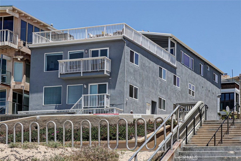 Ideally situated on the north corner of Marine Avenue and the Strand and fronting one of the best beaches in town, 2200 The Strand presents a once-in-a-lifetime opportunity. Currently a multi-residence property, this building encompasses four separate units and features an oversize deck overlooking the beach and displaying an unobstructed 180-degree view of the Pacific, from Palos Verdes to Malibu. The four units currently housed in the building offer rental property opportunities and feature two three-bedroom, two-bath units and two one-bedroom, one-bath units. The three-bedroom units both feature ocean views, kitchens with updated appliances and original details, and light and bright living rooms for easy seaside living. The one-bedroom units share the vast deck with incredible, panoramic ocean views and space for entertaining or lounging in the gorgeous Southern California sunshine. Large bedrooms, hardwood floors and updated appliances offer coastal charm and modern conveniences. Parking for seven ensures all residence parking needs are met. Located within walking distance of award-winning Grandview Elementary in the Gaslamp neighborhood, this property is also convenient for families. Both downtown Manhattan Beach and the shops and restaurants of North Manhattan are equidistant from this site. Wake up to crashing surf and take in breathtaking views and the sound of seagulls overhead from this perfectly positioned, multi-unit building in the heart of Manhattan Beach.