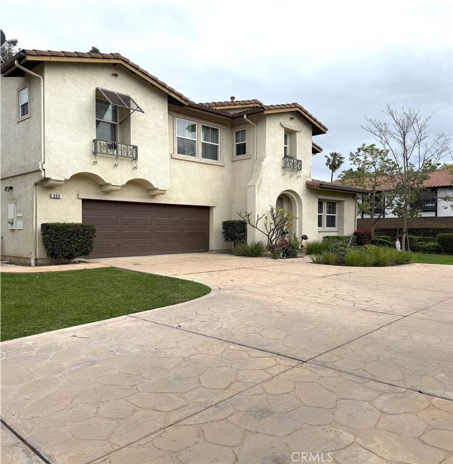 Beautiful Executive Residence in a Private Community in Covina!!  Home is located on a private street and a cul de sac. This executive residence is a 4 bedroom 3 bath home.  Upon entry you are greeted by a large living room with a fireplace and wall to wall laminated wood flooring!  Off of the living room you have the formal dining room.  The kitchen is extremely spacious with tons of counter space ready for all your family gatherings.  Off of the kitchen you have a family room with another fireplace.  There is a sliding door that leads you to the beautiful private back yard featuring plenty of sitting areas for your family gatherings.  Downstairs you have direct access to garage and 1/2 bathroom.  Upstairs you have the 4 bedrooms with one of them being a large and  beautiful primary bedroom with large bath room - his and hers sinks and large walk in closet.  One of the bedrooms has been converted to an office but can easily be converted into a bedroom if necessary. Laundry room is also upstairs. Upstairs there is also a study area with a built in desk. Home can be delivered partially furnished or unfurnished.