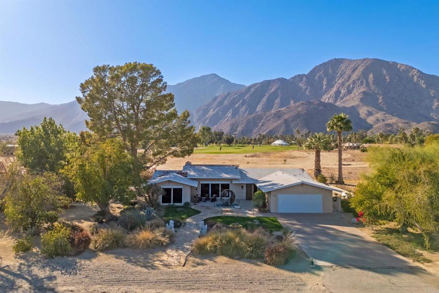 Lovely Moroccan inspired home located in the De Anza Golf Estates. Landscaping, fountain, BBQ and gates all custom designed by renowned metal sculptor John Richen. Granite counter tops, newer appliances, new AC, metal security shutters on all windows. Stunning views from both front and back of the desert, golf course and surrounding mountains. Featuring 3 bedrooms, 2 bathrooms with master suite on the other end of the house for privacy. Includes neighboring lot for a total of 0.82 acre giving plenty of room for a pool, guest house, RV parking, etc.