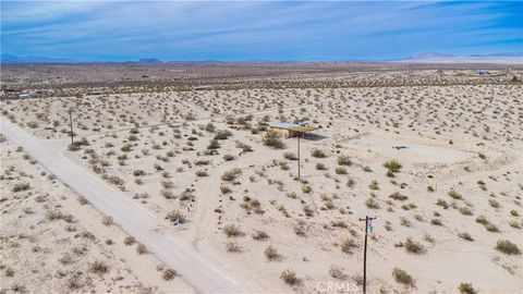 Photo of 67722 Pole Line Road, 29 Palms, CA 92277 (MLS # JT25043011)