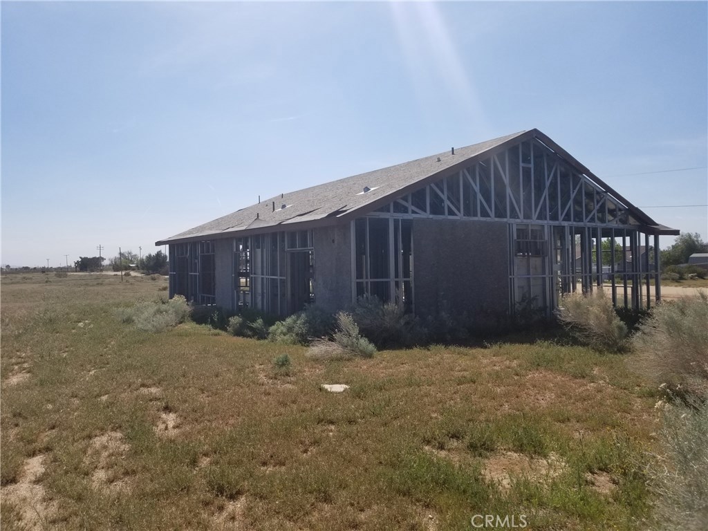 50 LOT subdivision with recorded map and deeded 50 lots with off-site improvements.Water, sewer, utilities and rough graded lots and streets with installed street lamps and fire hydrants. Property has 4 semi-completed steel framed houses which were to be used as models. Many of the City fees already paid and project is ready for development.