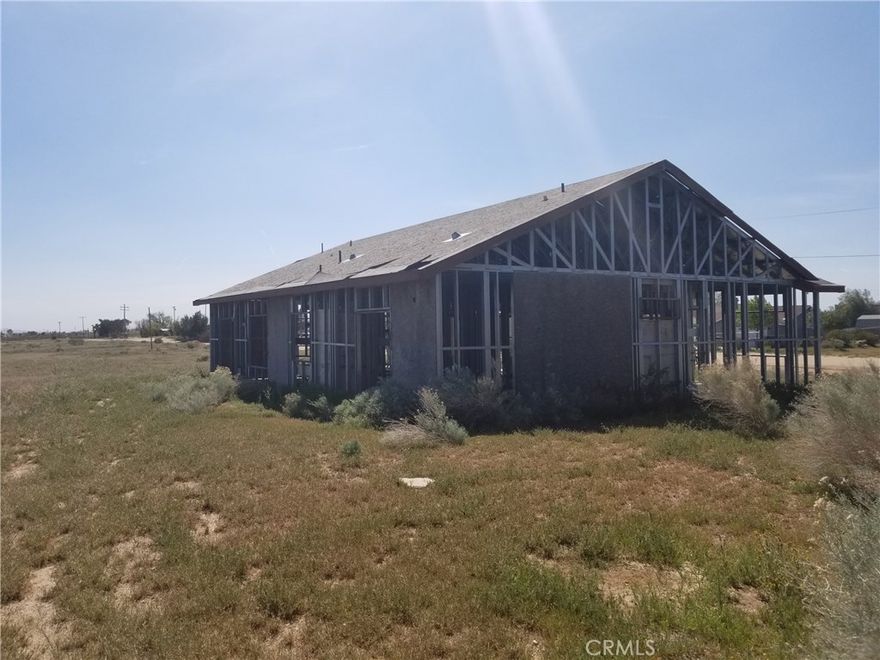 50 LOT   subdivision with recorded map and deeded 50 lots with off-site improvements.Water, sewer, utilities and rough graded lots and streets with installed street lamps and fire hydrants. Property has 4 semi-completed steel framed houses which were to be used as models. Many of the City fees already paid and project is ready for development.