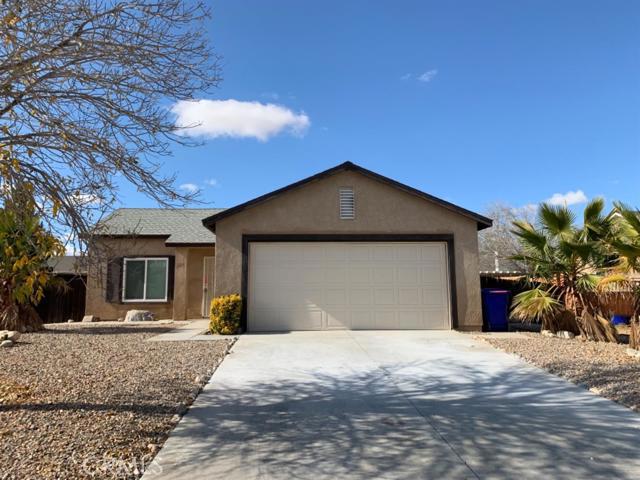 One of the lowest price turn key houses in the high desert! This house has beautiful curb appeal with palm trees in the front! fresh paint, new quartz countertops! new backsplash. This won't last long!