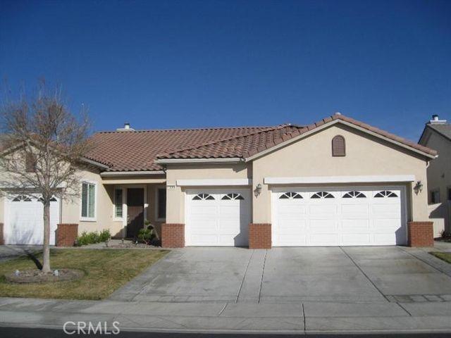 Beautiful Pulte built home in The Estates of Apple Valley. Beautiful home in a gated community with a tile roof, 4 car fully finished attached garage with roll up doors. Formal living and dinning room with a media room also. Open family room, nook and kitchen with built in fireplace, corian counter tops, walk in pantry, double ovens and 9 foot ceilings throughout the entire home. Separate indoor laundry room, large bedrooms and a very spacious master suite. Master bathroom has two sinks, over sized oval tub, walk in shower and walk in closets. Very good condition home with two tone paint and crown molding and built in speaker system throughout. Association Amenities: None # of RV Spaces: 0NONE Lot Location Type: Standard Location Special Features: None # of Attached Spaces: 4 # of Detached Spaces: 0