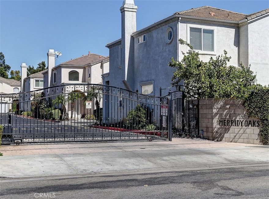 Prized to Sell!  Free standing, detached 2 story townhouse in the beautiful Merridy Oaks gated community.  Fantastic unit with natural light and high ceilings. Enter into a spacious living room that opens to a formal dining room, nice open kitchen with breakfast nook that leads to a large family room with gas fire place, there's also a half bath and laundry room.  Granite, tile and laminate wood floors throughout, crown molding, wrought iron stair case with granite rail that leads upstairs.  Double door entrance to large master suite with walk in closet and full en suite bathroom which features a jacuzzi tub. There are three additional nice sized bedrooms along with a full bath, skylight and loads of storage cabinets.  Direct access double car garage, low maintenance private backyard. Walking distance to CSUN, close to shopping and entertainment.  Perfect opportunity for first time home buyers or investors looking for positive cash flow.