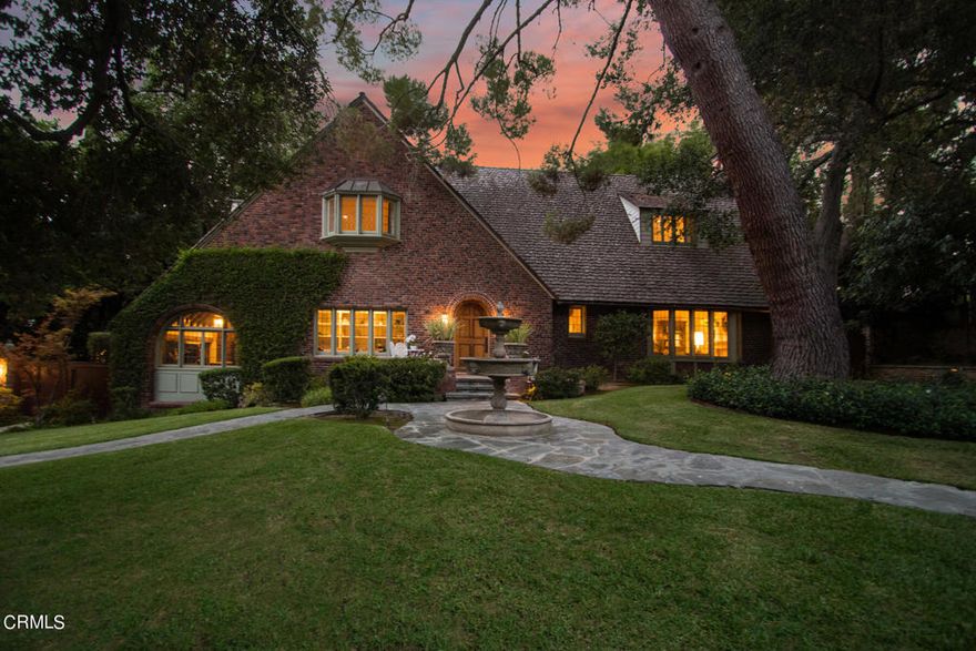 Ideally situated between Lacey Park and The Huntington Library, you'll find this stunning estate, originally designed by the architectural firm of Marston, Van Pelt, and Maybury. Built in 1925, this Tudor home has stunning brick work, classic beamed ceilings, and leaded glass windows. Intricate details, delightful surprises, and modern comforts complete the allure of this property. The sparkling pool and spa, outdoor kitchen, and the grounds have been lovingly maintained, ready for the new owners to enjoy.