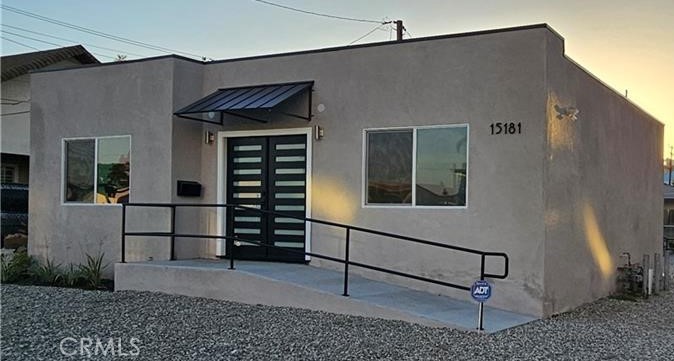 This area has currently been rezoned from commercial (C2) to mixed use zoning. Up to 7 Units can be built or 14 affordable income units. This Property boosts a huge lot over 9,000 SqFt. The interior of the front house was converted into office space and/or showroom (No Bedrooms). Both units have recently been renovated. The estimated rent for each unit is approx. $2,900 per Month. The front unit has 2 bathrooms (1 Bathroom is Handicap), an office and large show room, new roof, new stucco, new electrical wiring throughout & 200 amp panel, ductless heater & AC, all new copper plumbing, tankless hot water heater, new windows, new doors, double door entry in front and back, new flooring & paint. The rear unit has a new 200 amp electrical panel, central heating & AC, dual pane windows, new doors, new flooring, new paint, new kitchen & bathroom. This property has so many possibilities and a must see to envision and create your own master piece.