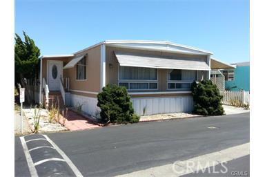 Well maintained double wide manufacture Home in nice family Mobile Home Park. Spacious 3 bedrooms / 2 full bathroom. Master bedroom has a remodeled master bath room with spa bath tub. Extended living room with foyer. Nice clean kitchen with laundry room closet. Community Pool Area with Club house and Community Laundry Room Facilities.