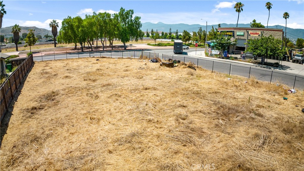 Fantastic Opportunity! .47 Acres of Commercial Residential Property!!! Property features 2 separate parcels on a corner lot, one parcel has a home with 1,554 square feet of living space, ample parking, adjoining land lot is fully fenced, zoned C-1/C-P CR land use designation commercial, low tax rate, and so much more! Hurry this will not last!!!