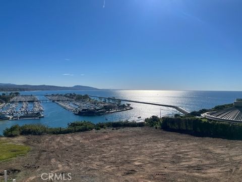 Photo of 34412 St Of The Green Lant, Dana Point, CA 92629 (MLS # OC22023360)