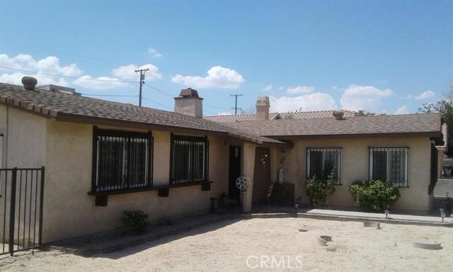 JUST REDUCED AGAIN $27,500!!!!since 8/6/18 SELLER is Motivated.Squeaky clean home includes all stainless steel appliances in kitchen and washer & dryer in garage. When home was built city would not approve the slope into garage so garage was made into great Family room and a detached garage was placed behind home. Owner has given this home much tender love and care.doors,windows have been upgraded.Roof 6 years old.Sellers have had American Home Shield in affect since purchased in 1990. Everything is in excellent condition.Pellet stove insert in fireplace in living room and also another one in family room. Good supply of pellets in shed. Association Amenities: None # of RV Spaces: 0 Special Features: PTRY,SHNONE Lot Location Type: Standard Location Landscaping: Natural # of Attached Spaces: 0 # of Detached Spaces: 2