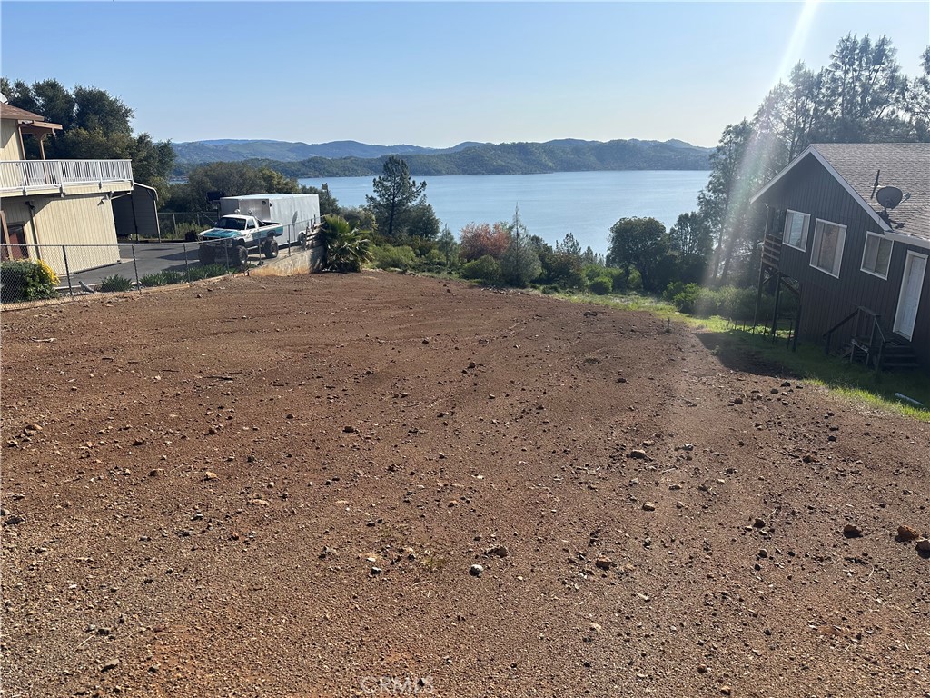 Beautiful buildable Lot with Lake Views! Take a look at this prime vacant land lot in Riviera West, offering stunning views of Clearlake! This community features fantastic amenities, including a clubhouse, pool, bocce courts, and a barbecue area for fun gatherings. The marina nearby provides easy access to boating and fishing. Don't miss this chance to build your dream home in a beautiful location! For more information on the HOA go to https://www.rivierawesthoa.com/