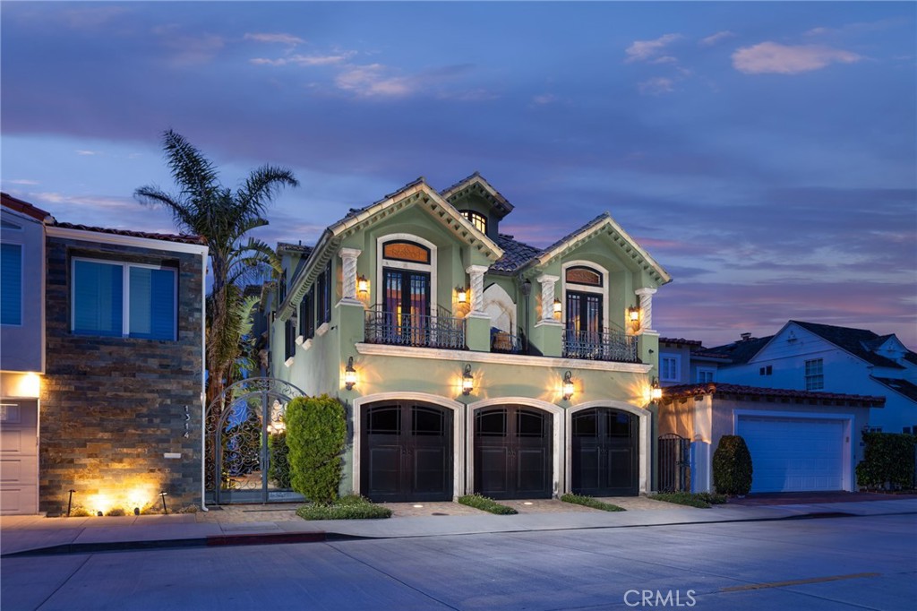 Welcome to your dream coastal retreat in Newport Beach, California. Located on the coveted Newport Beach peninsula, this magnificent bayfront property offers an unrivaled waterfront living experience. With direct access to the water, a private dock capable of accommodating a 60-foot boat and steps from the beach, this is home. Spanning an impressive 4,330 square feet, this custom-built Italian villa boasts meticulous craftsmanship and the finest materials throughout. Step inside to discover imported Crema Marfil flooring that exudes elegance and sophistication. The beveled windows, sourced from Germany, flood the home with natural light, creating a warm and inviting ambiance. Brazilian wood floors, heated throughout the entire house, provide both comfort and luxury. The residence features four spacious bedrooms and six beautifully appointed bathrooms, ensuring ample space for family and guests. Four fireplaces enhance the cozy atmosphere, adding a touch of romance and charm to each room. An elevator provides convenient access, making this home easily accessible for all. Indulge in the ultimate entertainment experience with a dedicated home theatre, perfect for movie nights and gatherings. Wine enthusiasts will appreciate the well-designed wine room, ideal for showcasing and storing their prized collections. Enjoy the stunning outdoor living spaces, starting with a large, inviting patio on the bayfront. Here, you can relax, dine, and entertain while relishing in panoramic views of the water. Additionally, a rooftop deck offers an elevated vantage point to take in breathtaking vistas of Fashion Island and Newport Coast, making it an idyllic spot to watch the sunset. The professional gourmet kitchen is a chef's delight, complete with a 6-burner stove, double Thermador oven, and a walk-in pantry. This culinary haven allows you to unleash your creativity and effortlessly prepare delicious meals for family and friends. The primary suite is a sanctuary of luxury, offering serene bay views and a tranquil atmosphere for ultimate coastal living. Retreat to this private haven after a long day, unwind, and wake up to the soothing sounds of the water. Discover the epitome of coastal elegance and make this bayfront retreat in Newport Beach your forever home. With its exceptional location, exquisite design, and an array of luxurious features, this property presents an extraordinary opportunity to experience the quintessential Southern California lifestyle.