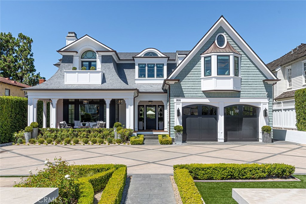 The Utimate FAMILY house on one of the biggest lots in the Port Streets. This 7 bed, 10 bath, 7043 sq ft home is an Architectural Dream inside and out with exquisite craftmanship and detail. The fully-gated 14,200 sq ft lot is fully enclosed and lined with tall mature hedges that create a Private Family Compound. The front yard has seating in the Front Patio where you can watch your kids jump on the large in-ground Trampoline and Play on the 70' x 30' Basketball Court. The back yard feels like Luxury Resort living with tall mature hedges and approx 1,400 sq ft of exotic wood decking in the covered living areas that step down to the large Pool and Spa that boasts stone pool decks and fire pit area. Entertain your friends in the Pool House that includes a spacious separate guest suite (or office) upstairs. The open layout of the house features a Luxury Kitchen with carrera marble counters that center around the Stunning La Cornue Grand Palais double oven and range. The back of the home features motorized panel doors that completely open the home into the covered living areas creating amazing indoor/outdoor living. Amazing Master suite with a bathroom that rivals any luxury spa. Every bedroom is oversized with a walk-in closet and bathroom. Custom bleached Walnut flooring throughout. Custom shiplap and cabinetry throughout the house. Custom wood ceilings in nearly every room. Fully automated house with Crestron AV system. TRULY ONE OF THE FINEST HOMES IN THE PORT STREETS