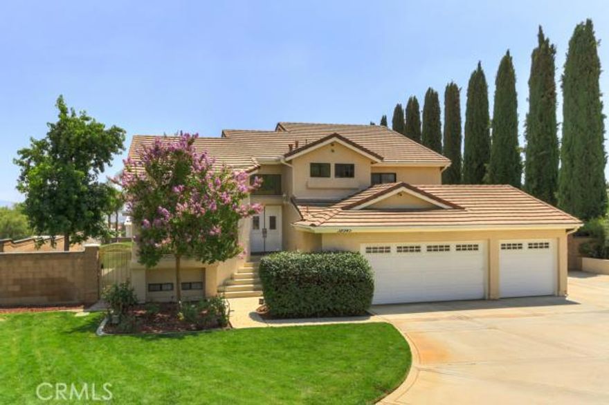 Beautiful home in the foothills of Cherry Valley. This gorgeous home has 5 bedrooms (the basement was converted into 5th bedroom), 3 baths, master suite with fireplace, and a backyard built for entertainment. Pebble tech pool and spa with a rock waterslide and waterfall. The 1.2 acre lot also features a 3200 square foot custom built building at the back of the lot. This building has two 13 foot steel doors on the front, two 10 foot doors on the side. The back of the building features a full size batting cage, complete with equipment. The inside of the building has epoxy floors, loft, ½ bath and office area. It is wired for 120 and 220 volt electricity and has its own small septic tank and water. The building was used as storage for a construction company and also for large fundraising parties. Can accommodate 125 guests. The building has endless possibilities; RV and boat storage, parties, gymnastics or sports, shop, and much more. There is also plenty of room for horses. Don’t miss out on this opportunity! Call and schedule your private viewing today.