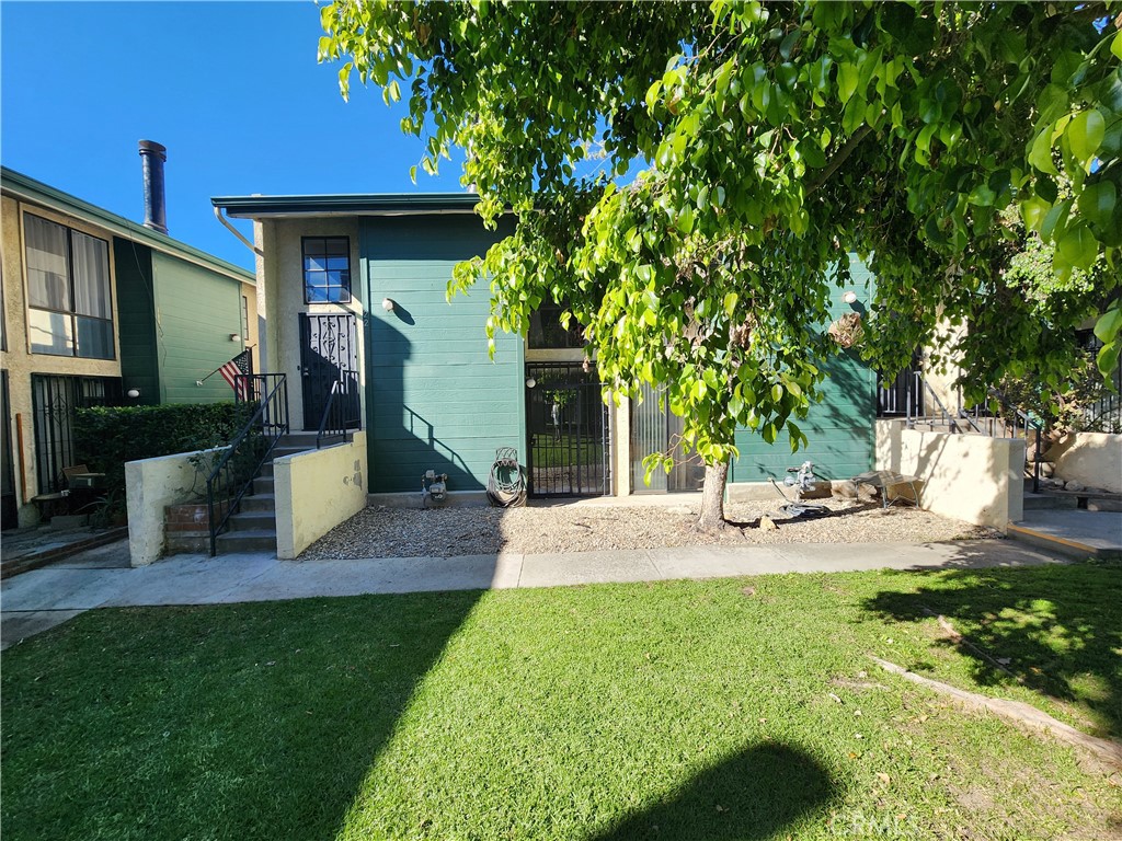 Welcome to this modern-designed end-unit townhouse nestled in the heart of Sun Valley. This 2-bedroom, 2-bathroom home offers 1,102 square feet of comfortable living space across two levels. Upon entering, you'll be greeted by vaulted ceilings that enhance the spaciousness of the living area. The kitchen, equipped with modern appliances, plentiful cabinet storage, including a new stove and microwave. The kitchen opens seamlessly to the living room, creating an inviting space for entertaining. The living room includes a cozy fireplace that adds warmth and charm to the living area. The townhome is fully lapsed with laminated-wood flooring. Two ensuites include a full closet, bright windows, and seamless bathrooms. The in-unit laundry and washer adds to the convenience factor. Upon exiting the unit faces access to a beautiful greenbelt area that is ideal for a morning cup of coffee and is situated within a well-maintained complex. Currently, the unit is tenant-occupied and lease end date is enlisted as November.