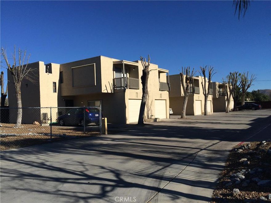 A Quiet & beautiful Condo with a view to courtyard Unit #6. Living room, kitchen and dinning nook down stairs. Open Kitchen with granite countertop, electric range and dishwasher. All 3 bedroom are upstairs, 2 share bathroom at hallway and master bedroom has it's own bathroom and walk-in closet. Bathrooms have granite countertop and wood cabinets. Laundry with washer & dryer at garage. Attached 1 car garage. Walking distance to Park, grocery stores, schools, lake, camp grounds and restaurants. Easy freeway access to 15. Water, maintenance and landscaping is included in rent.