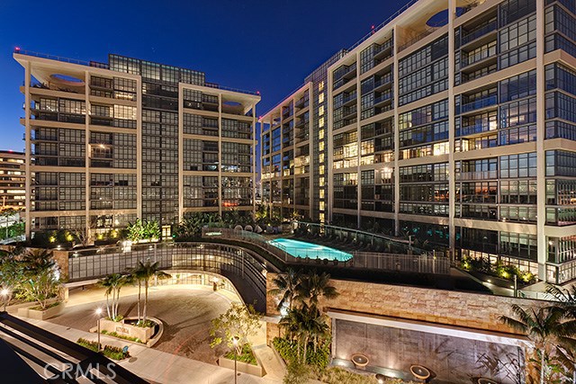 Beautiful "Bel Air" model single level Penthouse located on 14th floor with city views. Featuring 1,772 square feet of luxury living space, 2 bedrooms plus den, 2.5 bathrooms, spacious balcony, assigned parking, custom dark hardwood floor, white cabinetry and corian countertops in kitchen, designer light fixtures, soaking bath tubs, Electrolux stainless steel refrigerator and beautifully tiled bathrooms. Resort-style landscaping features an elevated terrace with pool & spa, fitness center, outdoor entertaining areas, business center, concierge service, and secured parking with complimentary valet. Live in Orange County's newest resort-style master planned community...The Central Park West. Astoria represents the pinnacle in Orange County Luxury High-rise living.