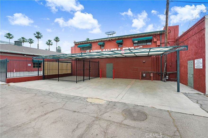 Prime Downtown San Bernardino Investment Opportunity.  Offered for sale, the former San Bernardino Pawn Shop and Loans building presents an exceptional opportunity for investors, business owners, and developers seeking a strategically located, high-potential asset in the heart of the city's bustling downtown district. This secure, versatile property sits on a 44x120 lot, with a spacious building offering a flexible floor plan that is well-suited for a wide array of uses. The property is fully gated and features roll-up metal walls on most front windows, ensuring a high level of security and privacy.  The expansive interior includes a large showroom with street access, multiple private offices, sizable display windows, an impressive street-facing sign, and two bathrooms. Additional amenities include a utility room, a dark room, storage rooms, reception area, kitchen, and upstairs offices, as well as adaptable living and storage spaces.  Perfectly situated on a busy, tree-lined street, the property is ideally positioned to cater to a range of commercial ventures, including offices, retail spaces, restaurants, clubs, medical offices, dispensaries, educational facilities, and more. The zoning (CR2) allows for a broad spectrum of regional-serving uses in the downtown area, making it an excellent choice for repurposing and redevelopment. 

This is an outstanding opportunity to reposition a well-located asset with tremendous upside potential. While the building is currently undergoing renovations, it has been thoughtfully designed to accommodate a variety of business needs. The existing structure provides an ideal canvas for an owner to take over the project and complete the improvements, adding further value to this prime real estate.  Building is fully functional and operational and may benefit from cosmetic upgrades and some repairs. Disclaimer: Please note, the property was previously under renovation and, as such, certain alterations, including the addition of partition walls and doors, may not be reflected in the current photos. The building’s renovation is an ideal opportunity for an investor to complete the project to their specifications, bringing the space to its full potential and complying with all city requirements.  All information provided is deemed reliable but not guaranteed. Buyers are encouraged to conduct their own due diligence.