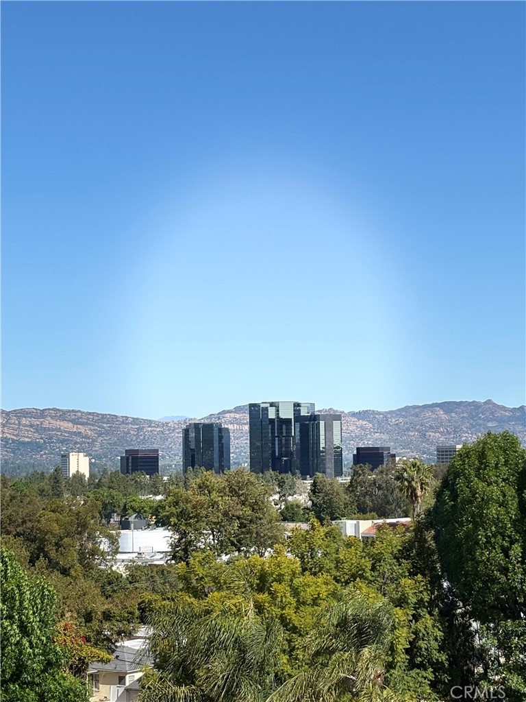LOCATION,LOCATION,LOCATION!!! Affordable downslope lot South of Ventura Blvd with incredible views of Warner Center, neighborhood, and mountains. Not in the restrictive Mulholland Corridor and does not have oak trees to deal with. This is one of the very few remaining view lots with these qualifications. No extra delays. Just get your plans and build. seller has a survey, topo, geo, and soils report from a previous transaction that will need to be updated (SEE SUPPLEMENTS). Woodland Hills has seen a huge increase in demand with the development of the Warner Center. It is now the home of the Los Angeles Rams and is emerging as a shopping and entertainment center with new trendy restaurants at the Village, a first class shopping center, and a new state of the art movie theater. Woodland Hills is also known for great schools and easy access to the beach. Not many left when this one is gone.
