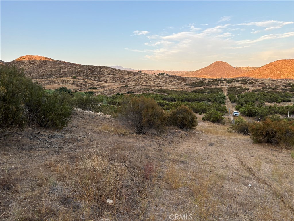 *****JUST REDUCED $20,000**** DON'T MISS OUT!!!!!!!!Located at the end of a cul-du-sac on a private road, Jonas Ct. Magnificient views of the valley and mountains. Manufactured homes allowed. Great weekend get away or ranch. Growing area of Sage just east of Temecula wine country where land is still affordable. Minutes away from the wineries, fine restaurants,and shopping. Water well and septic tank area. Away from the maddening crowd and still close enough to the city benefits. Bring your horses animals, and all your toys and enjoy the clean air and freedom of country living.