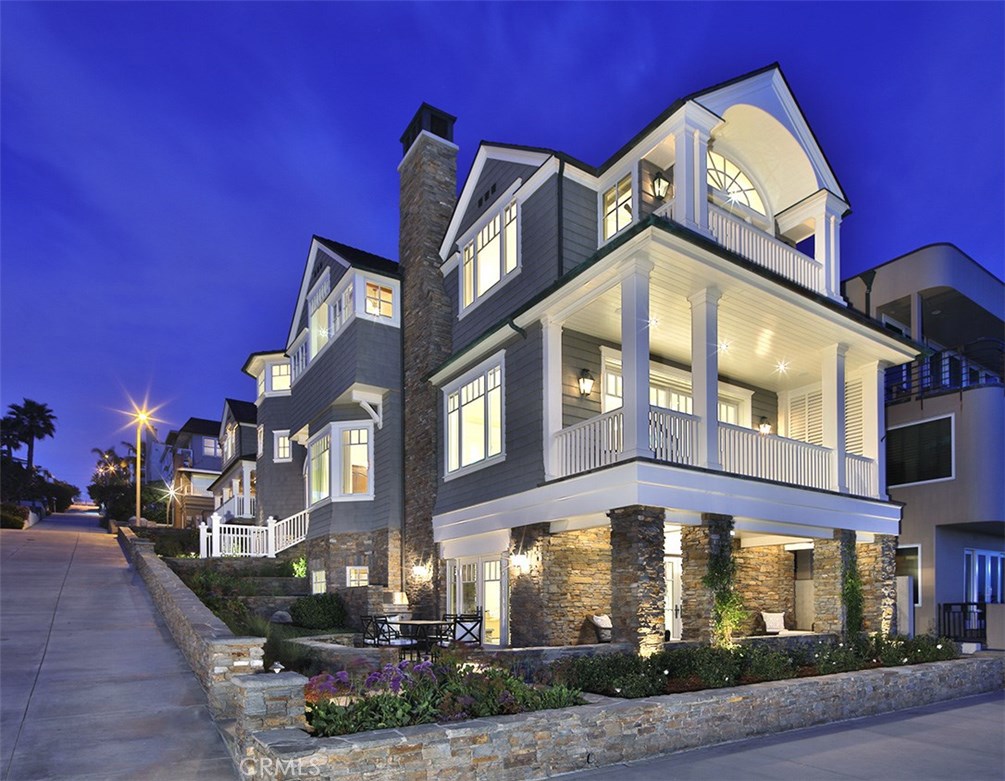 Seaside Architecture as Art: The premier Oceanfront Masterpiece with amazing views and beach front, offering the dream Manhattan Beach life style. A Once-In-A-Generation opportunity to obtain the rare combination of elegant NEWER CONSTRUCTION on a COVETED CORNER LOT. Designed by renowned Architects Grant Kirkpatrick and Erik Evens of KAA Design Group in a brilliant collaboration with Strand master builder David Garinger… no expense has been spared in executing the finest craftsmanship and detail in this ELEGANT AND TIMELESS California Coastal property. The Hamptons inspired design offers a spectacular 5,500 square feet, 5 bedrooms, 5.5 baths, in-laws quarters, 2 kitchens, formal and informal living areas, 3-stop hotel elevator and 3 car garage plus BEACH CARPORT. Capturing the rare beachfront elements of PRIVACY AND PARKING and ideally located in the Strand’s more private North-End, this is a Family Heritage Estate for the decades. Just a short 2 block stroll to charming North Village shops, you will also delight in being only minutes drive to LAX. With elite Strand construction taking up to 3 years and PRICED WELL BELOW COMPS AND REPLACEMENT COSTS, this is a One Of A Kind, Don’t Miss, Upside Opportunity! Please call listing agent for a personal appointment or for details.