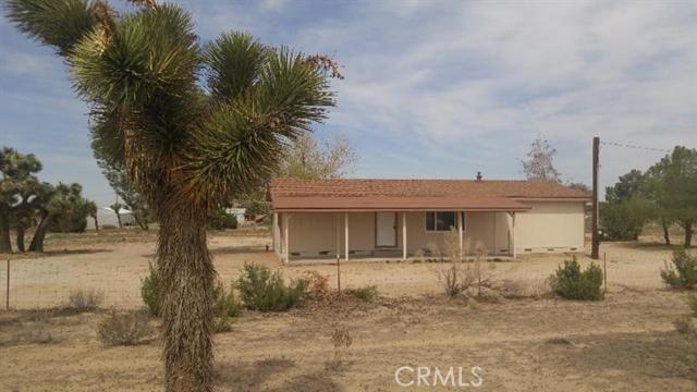 Enjoy the beautiful mountain views from the front porch or living room, in this recently refurbished home! This property provides the authentic desert lifestyle, without sacrificing long drives to amenities. Approximately .2 miles from pavement, 5 miles from downtown Phelan, and just 16 miles from Wrightwood's ski resorts! For less than a rent payment, you could own this home on over 2 acres with plenty of room for livestock! Move-in ready with new floors, repainted inside and out, new roof, and new windows! Association Amenities: None # of RV Spaces: 0 Special Features: SHNONE Frontage Type: Dirt Road Lot Location Type: Standard Location Landscaping: Natural # of Attached Spaces: 0 # of Detached Spaces: 0 Construction Materials: Perm w/o 433