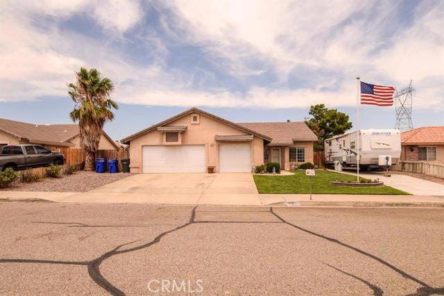 This newer built home has it all. 5 Minutes to 395, 10 minutes to all shopping imaginable. You will live in a quiet neighborhood on a cul-de-sac with a 3 Car Garage, RV Parking, Boat parking and Large Storage Shed. You will own the Solar System that is less than 4 years old. Solar warranty has 21 years of Power Output Performance left that can be transferred to the New Owner - Buyer to Verify. This home is freshly painted. It has 3 Bedrooms plus a den/office that can be a 4th Bedroom. Formal Living Room and separate Family Room opened to the Kitchen and Dining Area. Beautiful back Covered Patio to entertain your guests. Large closet Pantry in the Kitchen and also in the Indoor Laundry Room. Large Master Bedroom & Walk-In Closet. There is a 220 outlet in your finished Garage with lots of shelves and built-in workshop area. A/C Condenser 2 years old and so much more. Take a walk thru the pictures and see your dream home... Association Amenities: None # of RV Spaces: 0 Special Features: CC,,PTRY,SK,SH,,WKNONE Lot Location Type: Standard Location Special Features: Garage Door Opener, Underground Util: # of Attached Spaces: 3 # of Detached Spaces: 0