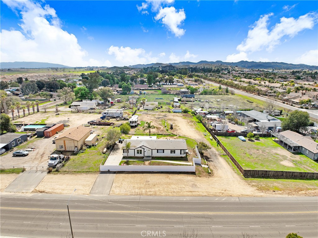 27321 La Piedra rd features a 2,016 sq ft 3 bedroom 2 bathroom 433A certified Manufactured Home on a permanent foundation built in 2000 on just under 1 acre located in the "Community Core" of Menifee's Economic Development Corridor. This large lot has development potential & the neighboring properties 30525 Old Windmill rd, 30550 stern dr, 30581 Old Windmill rd, 30620 Old Windmill rd, 30640 Old Windmill rd & 30645 Old Windmill rd are listed for sale as well.