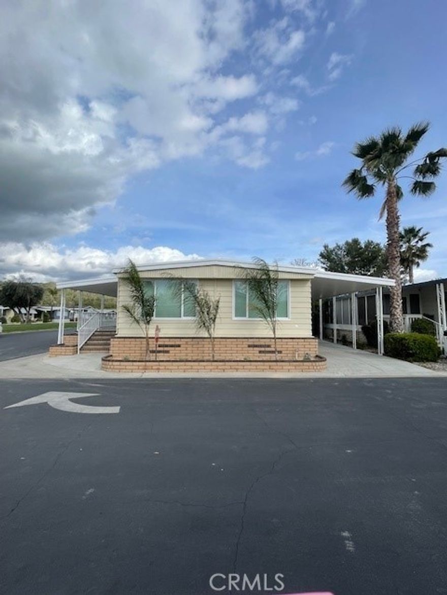 Located in a desirable 55+ community...This home has been completely remodeled. Included with brand new stainless steal refrigerator, dishwasher, stove and microwave. Can lighting throughout with pendent lighting in the kitchen. This beautiful 2 bed 2 bath home wont last long.