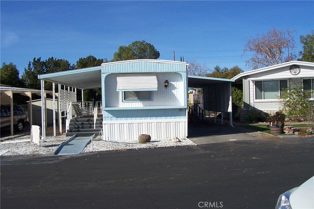 Remodeled 2 bedroom/ 2 bath home in the only mobile home park in Temecula. (Heritage Park is a 55+ owner only park) Bedrooms & Bathrooms are separated with the kitchen and living/dinning area between them. two car tandem parking. Two outside sheds. Many new changes from flooring to kitchen features... lighting, bathroom.. etc. Please view interior photo's.