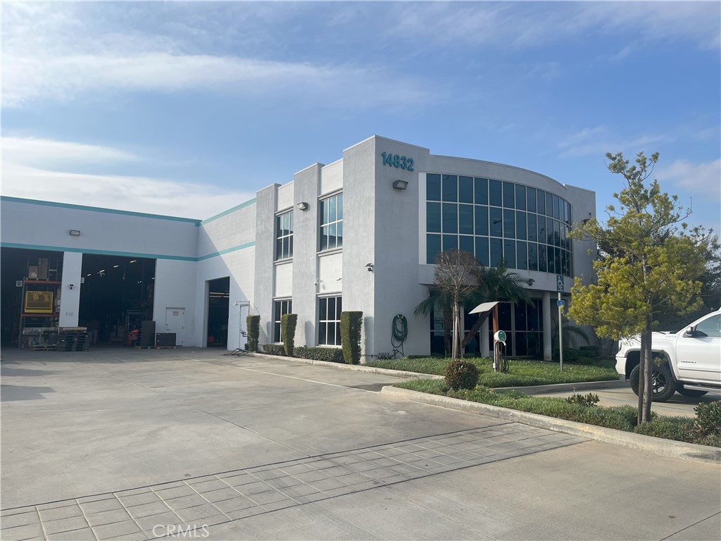 Free-standing 18,590 SF industrial building situated on approximately 31,793 SF of land. This property has a fenced and secured yard that is paved with 20 parking spaces, electric car charger and an electronic gate. The warehouse area has open layout with permitted racking included. The electric service is 400 AMP, 480/277 Volt 3 Phase power, Three grade level doors (two: 10'x16' and one 10'x12'), 24-foot clear height, skylights and plumbing available in warehouse. The two-story office area is approx. 2K SF with a reception area, 3 offices, two restrooms, breakroom and large open working area on the second floor with floor to ceiling windows. The property is newer construction, well-maintained building along highly trafficked Arrow Highway. Close access within one mile to 605 freeway. Close to 210 and 10 freeways. Prominent frontage with excellent signage opportunities. High-pile racking can be included in warehouse area or can be removed. Excellent for distribution or manufacturing.