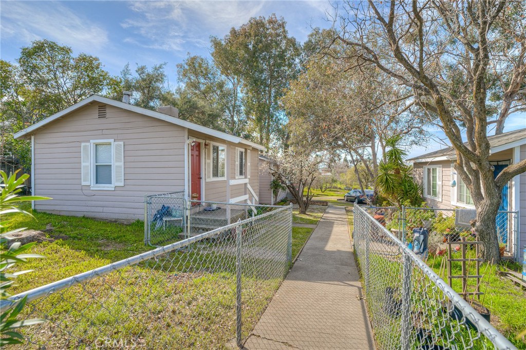 GREAT 3-UNIT INVESTMENT OPPORTUNITY IN A WONDERFUL LOCATION! You will love the location of this rental income property with trees and open space in a great neighborhood. Each unit is a 2 bedroom/1 bath cottage with its own fenced yard. There is an onsite coin-op laundry room for added income and property has space tenant parking. Fully rented with excellent rental history and income with long-term tenants. Current rents are below market amount. This is a great opportunity for your first investment property or to grow your established rental portfolio. Oroville is a growing community and the property is centrally located in an established residential area near schools, medical facilities and shopping. The property is close to downtown Oroville as well as Lake Oroville for recreational opportunities. Don't wait on this opportunity to purchase this special rental income property.