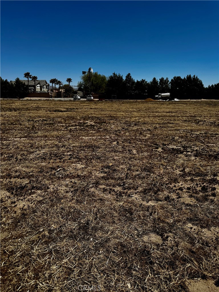 Discover the ultimate opportunity to create your dream home in the exclusive Dell Webb 55+ community of Sun City Apple Valley. Nestled near the corner of Jess Ranch Parkway and Lake Shore Drive, this parcel of land is one of the last unbuilt gem in the neighborhood. As the future owner, you have the unique privilege of selecting your ideal floor plan from upcoming designs when you’re ready to build, ensuring your home reflects your personal style and lifestyle. Thoughtfully planned in every detail, Dell Webb Apple Valley delights its residents with an invigorating array of amenities. The community's crown jewel, the Aspen Clubhouse, is a sprawling 22,000 square-foot recreation center that serves as the vibrant hub for social and fitness activities. Here, you’ll find a fitness center equipped with the latest cardiovascular and weight training equipment, an indoor lap pool, a grand ballroom, a creative arts and crafts studio, a card room, billiards, a library, and a computer lab. Just outside the Aspen Clubhouse, residents can unwind by enjoying two outdoor pools, lounging on a spacious patio, or engaging in friendly competition on two tennis courts and six bocce ball courts. For those seeking an invigorating workout, miles of scenic walking and biking trails offer the perfect setting. At the edge of the community, the intimate Mariposa Lodge provides an additional venue for wellness and creativity. This 8,000 square-foot facility features its own fitness center, aerobics studio, arts and crafts studio, and library, alongside an outdoor amphitheater that hosts lively events, including summer concerts and outdoor movies. Complementing these amenities are an outdoor pool, two tennis courts, and three bocce ball courts. Golf enthusiasts will appreciate the nearby 27-hole Ashwood Golf Course—a par-65 course set against the breathtaking high desert landscape, offering a relaxed yet challenging round of golf amid uniquely scenic views. This is a rare opportunity to be a part of a vibrant, active community where every detail is designed to enrich your lifestyle. Seize the chance to transform this unique piece of land into your personalized haven in one of Apple Valley’s most sought-after neighborhoods.