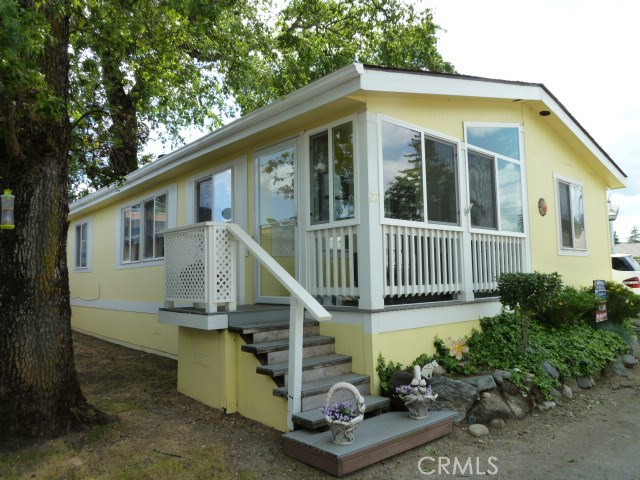 Upgraded 2Bd/2Ba Manufactured home within walking distance of beautiful Clear Lake. Kitchen, baths have been redone. New paint, flooring, new appliances, carpet, and window shades. Porch was closed-in to create a cozy sun room. Many more upgrades!