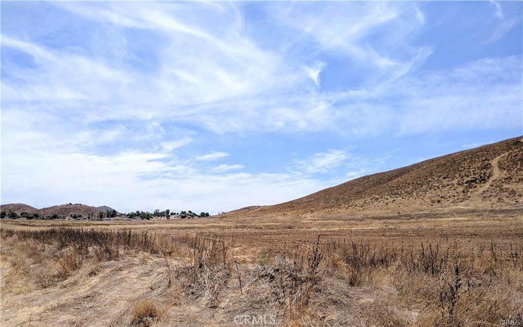 155.31 acres with incredible potential for developers and builders! Prime location next to the future realigned SR-79 and between the interchanges on Florida and Grand Ave. Expect high visibility and heavy traffic flow in the future as the realigned SR-79 becomes a major north-south route of San Jacinto valley, bridging I-15 and I-10. There's a planned Metro station on Grand Ave and a business park across the street on Stowe. Water and electricity connected. Just 2 miles north of Diamond Valley Lake. Please check with Riverside County for zoning and further details on the SR-79 Realignment Project.