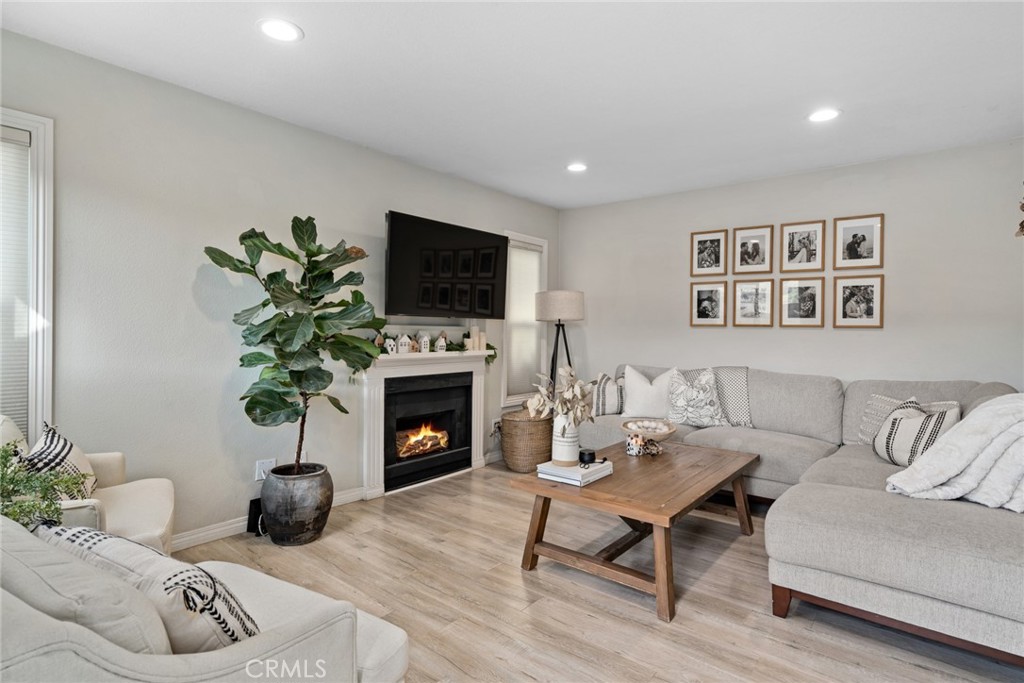 If you love Magnolia Farms and the interior design styling of Joanna Gaines, you're going to LOVE this home. As soon as you open the front door you feel like you've stepped into a magazine with all of the amazing finishes throughout. Light and bright are just the start for this 2 bedroom (dual primaries), 2.5 bathroom condo in the Villages of Yorba Linda. The kitchen boasts custom cabinetry and hardware, black granite counter tops and tons of useable counter space. The flooring throughout is truly perfection as well as the soft gray neutral paint color. All three bathrooms are upgraded with beautiful vanities, fixtures, including one of the showers with brilliant oversized subway tile that's simply breathtaking. I'll let the photos do the talking... look no further because you've just found your new home!