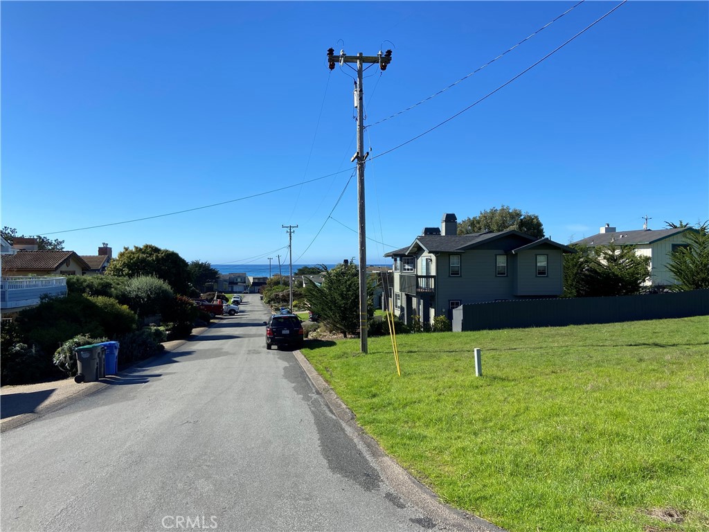 Sunny and flat is this Ocean View lot on the Marine Terrace in the Village of Cambria, just south of Big Sur! Easy level walks can take you to ocean accesses, Lampton Park at the south end ocean front, and the ever-popular Fiscalini Ranch Preserve, 420+ acres of excellent bluff walking and forest hiking! With vacant lots all around you, this lot is worthy of a water meter or wait list position transfer.