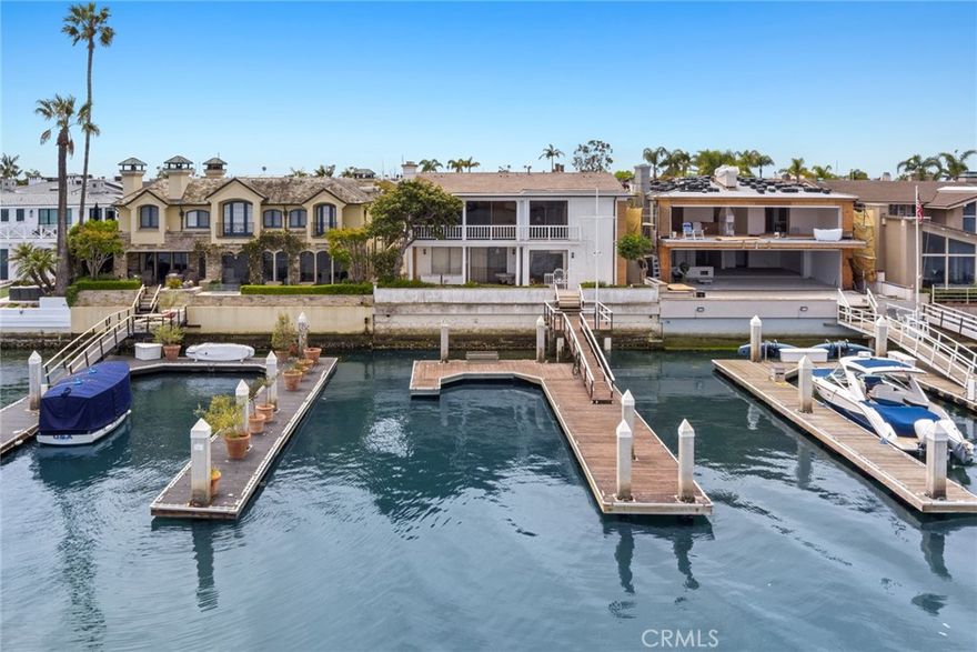 Nestled within the serene beauty of Lido Isle, this bayfront estate boasts an expansive lot directly overlooking the Newport Bay Turning Basin, offering unparalleled vistas of the shimmering bay waters, city lights and majestic mountain ranges.  After nearly four decades, this captivating property graces the market for the first time.  Spanning almost 6800 square feet of living space, the residence encompasses a grand entry, basement, family room, living room, dining room, kitchen and breakfast nook complemented by a butler's pantry and a library with access to a bayfront balcony.  With five bedrooms and seven bathrooms, including a primary suite with awesome panoramas, every corner captures the beauty of Newport bayside living.  Outside a large entry courtyard with a pool and a bayfront patio beckon for relaxation and entertainment while a generously sized dock stands ready to welcome a large yacht, ensuring endless opportunities to indulge in coastal living at its finest.  With high ceilings amplifying the sense of openness and grandeur, this extraordinary estate promises a lifetime of unforgettable moments.