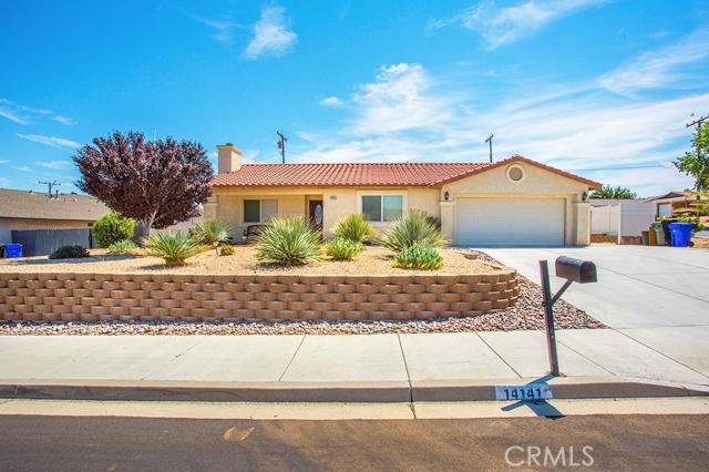 This beautiful home shows like new with lots of bright natural light. Featuring a gourmet kitchen with custom granite counter tops and attractive multi-color tile back splash, beautiful stainless appliances. Tons of cabinets functional granite counter island, oversize sink with nice size pantry. Gorgeous Hard Wood floor and Handsome Stacked Stone fire place with stately mantel in Living Room. Stunning French Doors and Deluxe Tile highlight the formal dining area and Family Room. Awesome floor plan with 3 oversize bedrooms and 2 spacious bathrooms. Convenient indoor laundry room with lots of extra cabinets. The master bedroom is well appointed with all of the master bath features your looking for. Wonderful curb appeal with well-manicured super attractive super efficient desert landscaped front with terraced landscaping stone wall. Classy white vinyl fence with tons of concrete that wraps around the house. RV parking and access in the front and back. The back yard is where this fine home really shines watch the beautiful sunsets, shoot some hoop with the kids or relax by your attractive stone fire pit. The spacious covered patio is entertainment central for that special party or the casual barbecue get together. Super location in desirable East Victorville. Close to great schools, shopping and restaurants. And best part No HOA fees or Mello-Roos! Association Amenities: None # of RV Spaces: 0 Special Features: ,PTRY,TS,SH,NONE Lot Location Type: Standard Location Special Features: Garage Door Opener, Underground Util: # of Attached Spaces: 2 # of Detached Spaces: 0