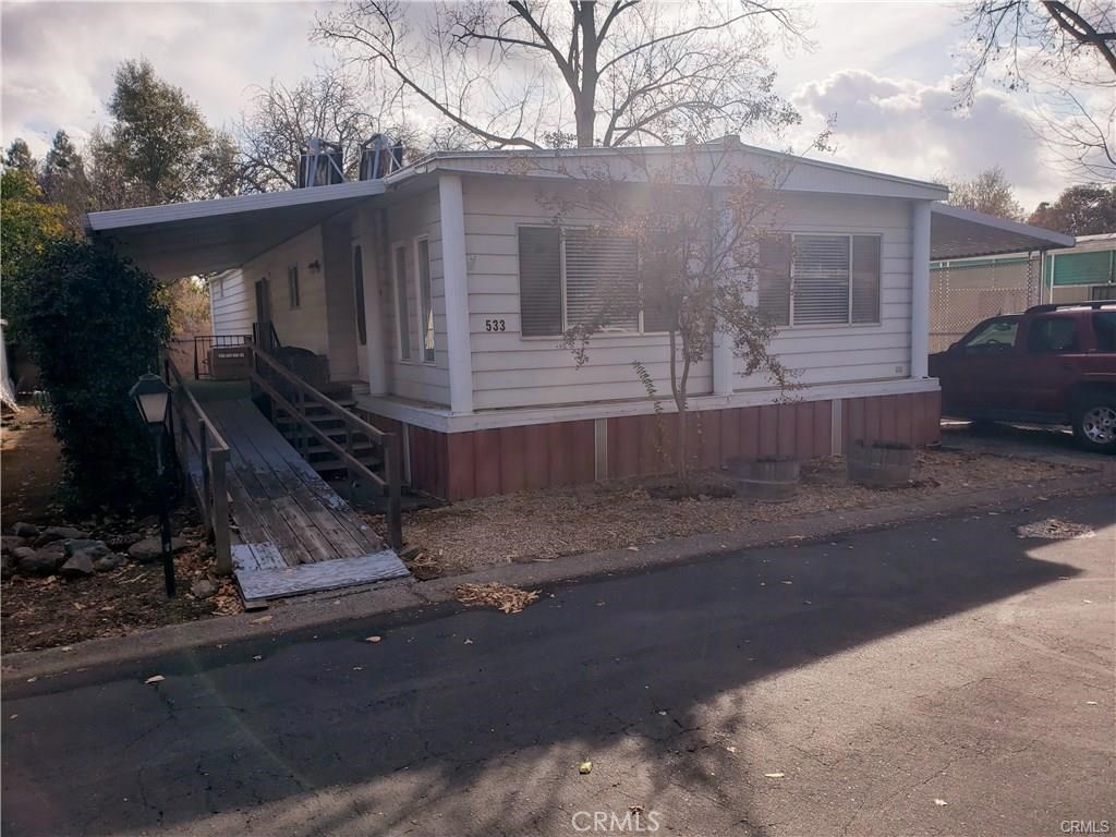 Welcome home! This 2 bedroom/2 bath, well-loved mobile home, is located in the Almond Grove senior park. Almond Grove is one of Chico’s most affordable and desirable senior parks conveniently located near restaurants, shopping, the bus stop and more! The living spaces are roomy and provide lots of built in storage space. Some of the flooring has been updated with wood laminate for easy care & a custom built ramp was added to the home for wheelchair access. The 2 outdoor storage sheds are included with the sale. Don’t forget, you’ll have access to community pool and clubhouse too! (The information contained herein has been obtained through sources deemed reliable but cannot be guaranteed as to its accuracy. Sq. ft., bed/baths , & lot size taken from public records. Buyer is advised to investigate to their satisfaction.)