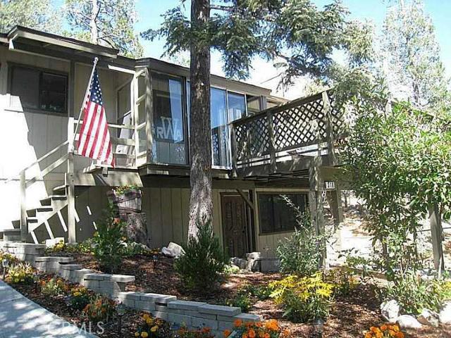 Adorable remodeled home! Living room with fireplace, dining room, awesome kitchen, 2 bedrooms and bath on the main level. Family/game room with fireplace, bedroom and bath, and laundry area downstairs. Extra large deck and large storage shed in addition to one car detached garage. Tons of parking. Nice family home!